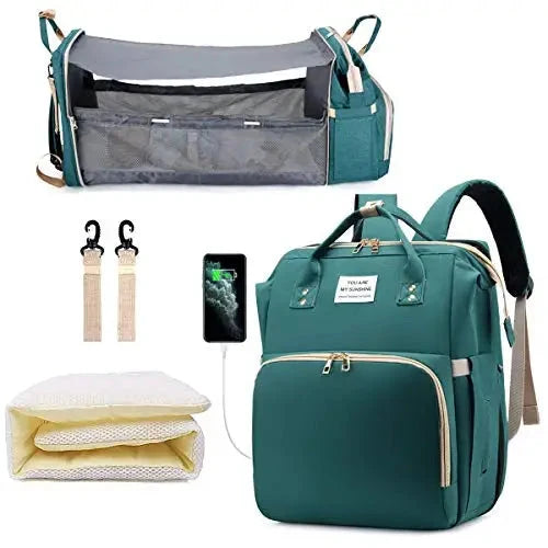 Teal diaper bag backpack with foldable baby bed and large zip front pocket