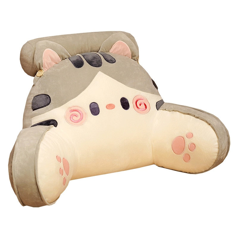 Grey cat reading pillow with cream belly panel, spiral eyes, and paw-print details