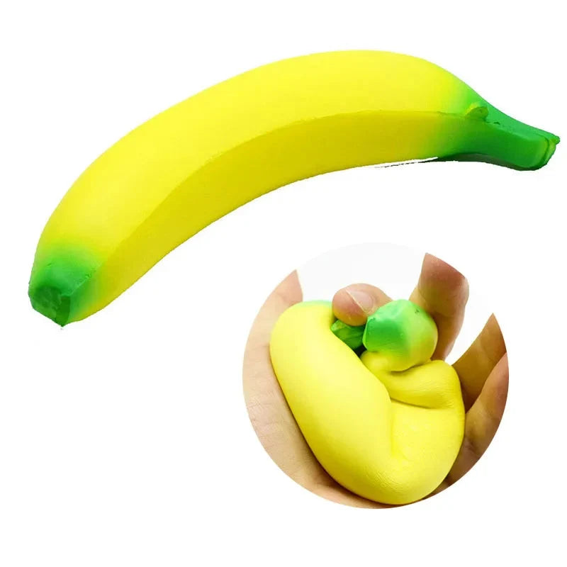 Jumbo squishy banana toy with green tip, plus an inset showing squeezing