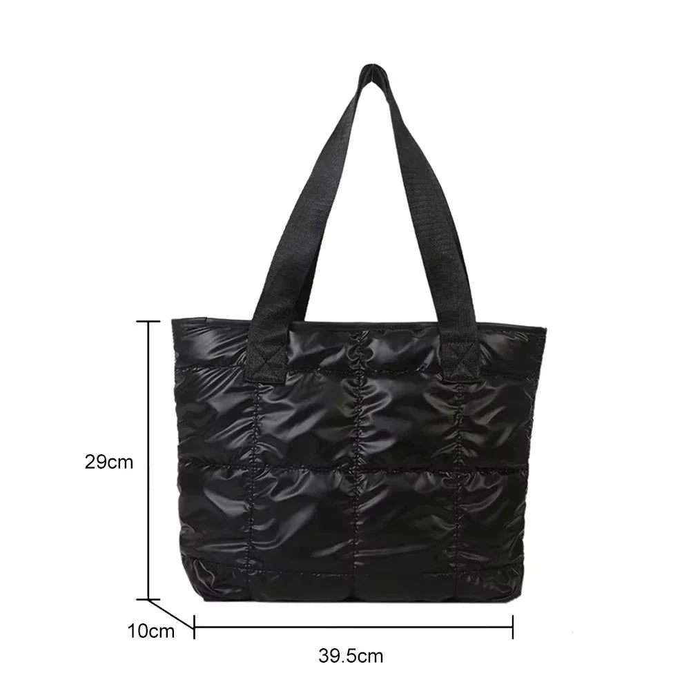 Black quilted tote bag: 39.5cm wide, 29cm high, 10cm deep; long handles