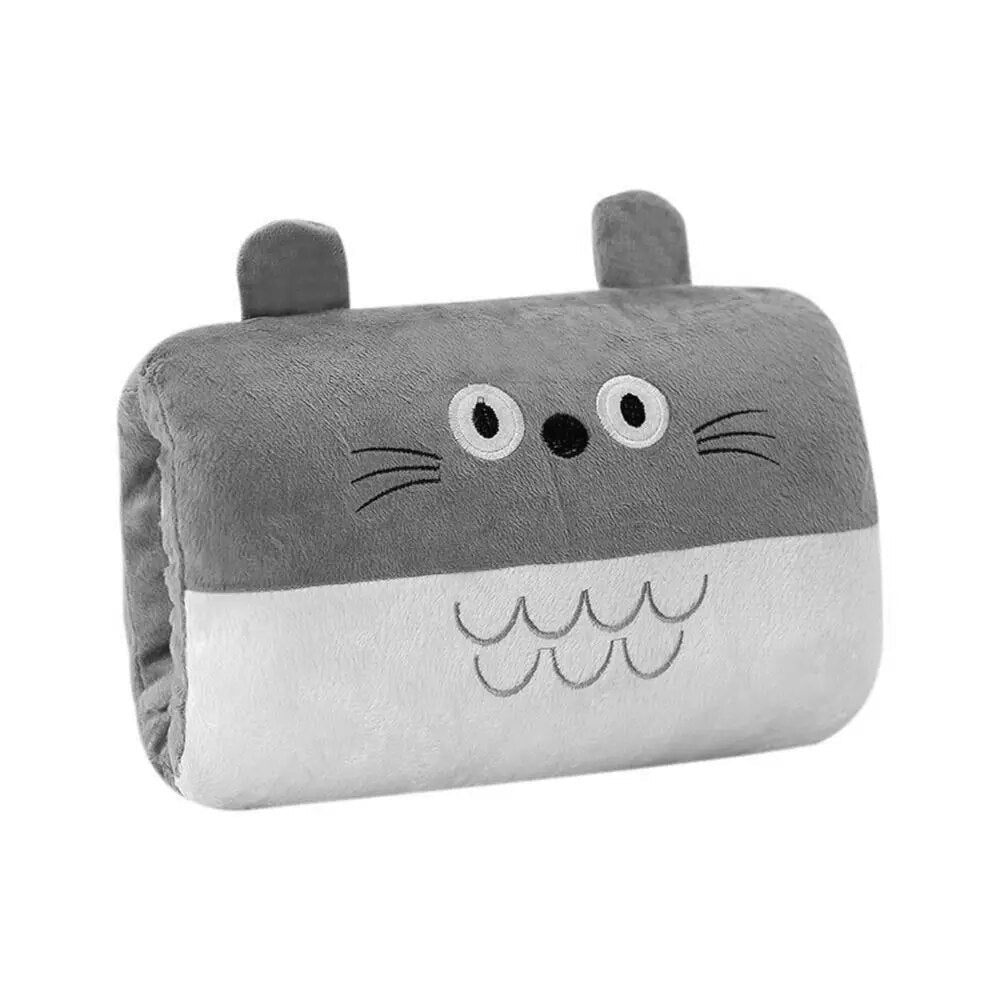 Gray plush hand warmer pillow with cat face, white belly panel and rounded ear pads