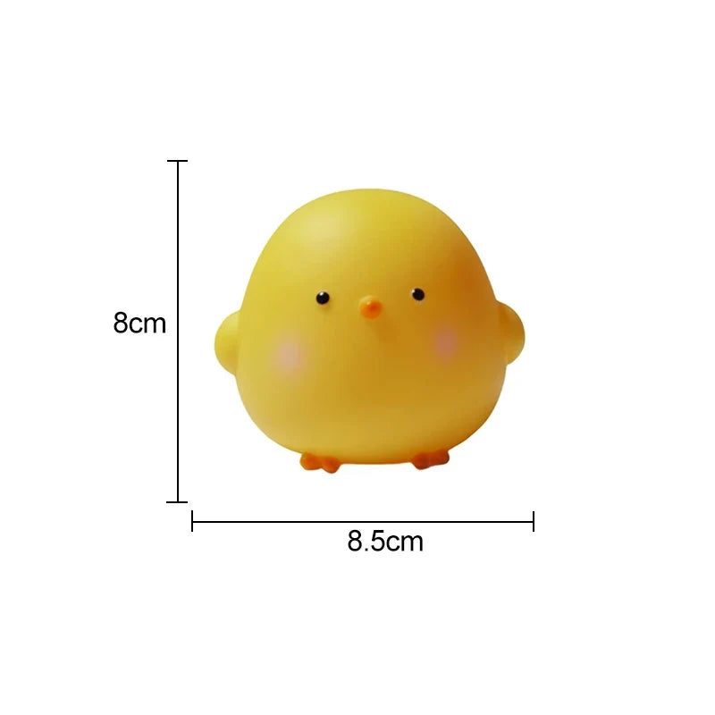 Yellow silicone chick LED night light with measurements shown