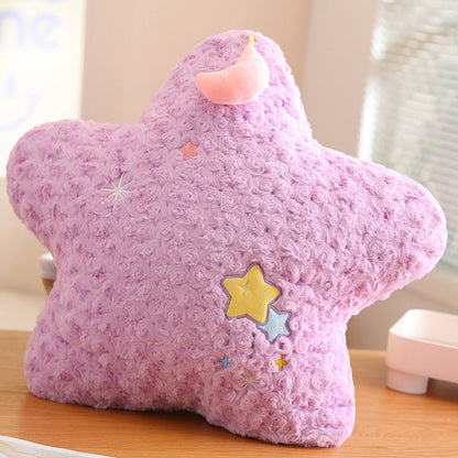 Purple star plush pillow with pink crescent patch and embroidered star appliques