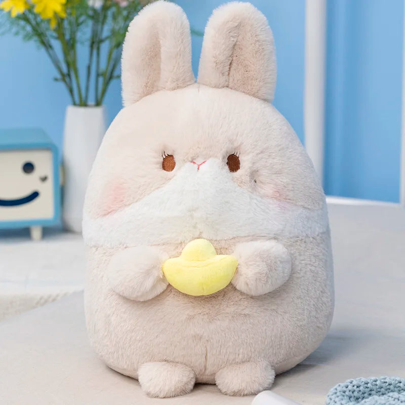 Cream bunny plush with yellow chick charm, facing forward.