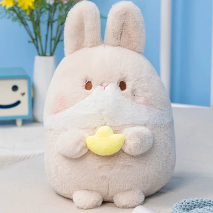 Cream bunny plush with yellow chick charm, facing forward.