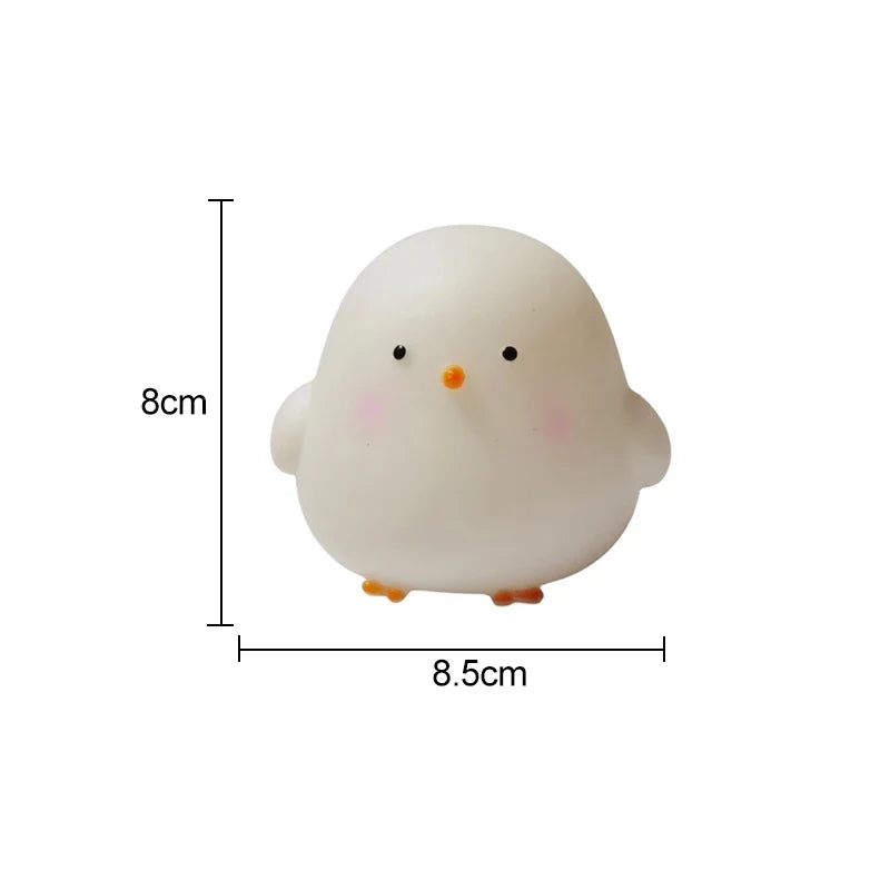 White silicone chick LED night light with measurements shown