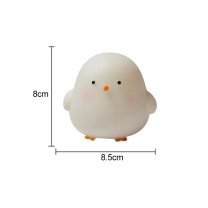 White silicone chick LED night light with measurements shown