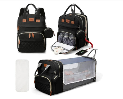 Black diaper bag backpack with foldable baby bed and multiple storage compartments