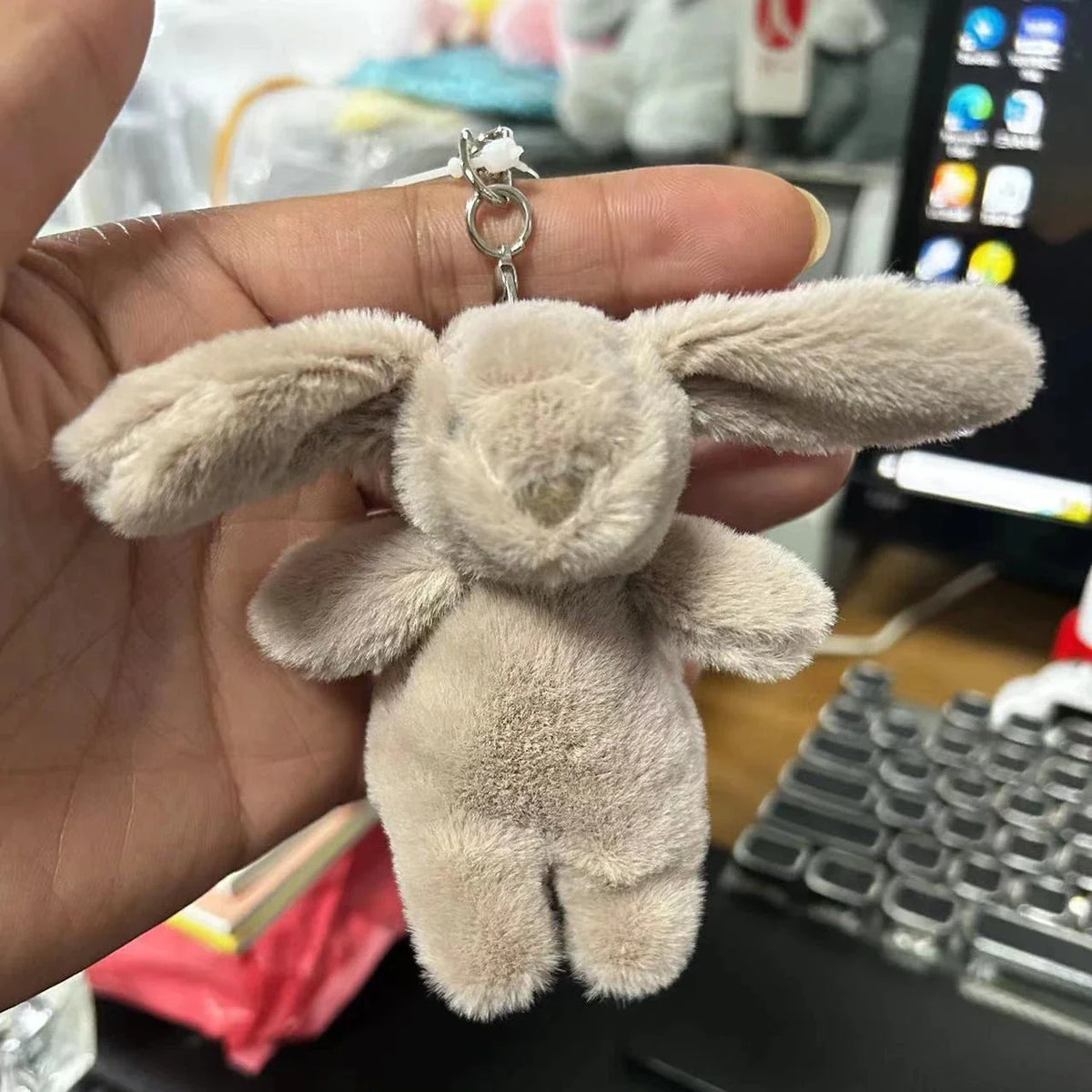 Cream rabbit plush keychain with long ears and silver chain clasp