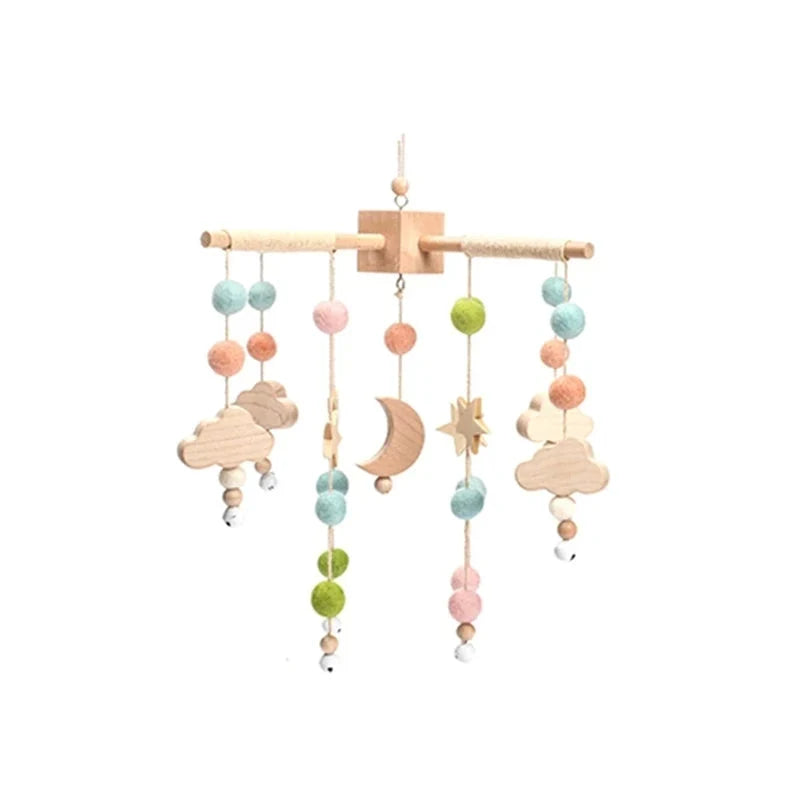 Wooden crib mobile holder with multicolor bead strands, stars, moon, and cloud toys