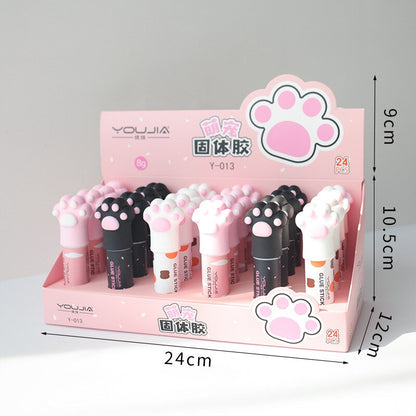 Cat paw glue stick box with paw-print caps and 24 cm size markings