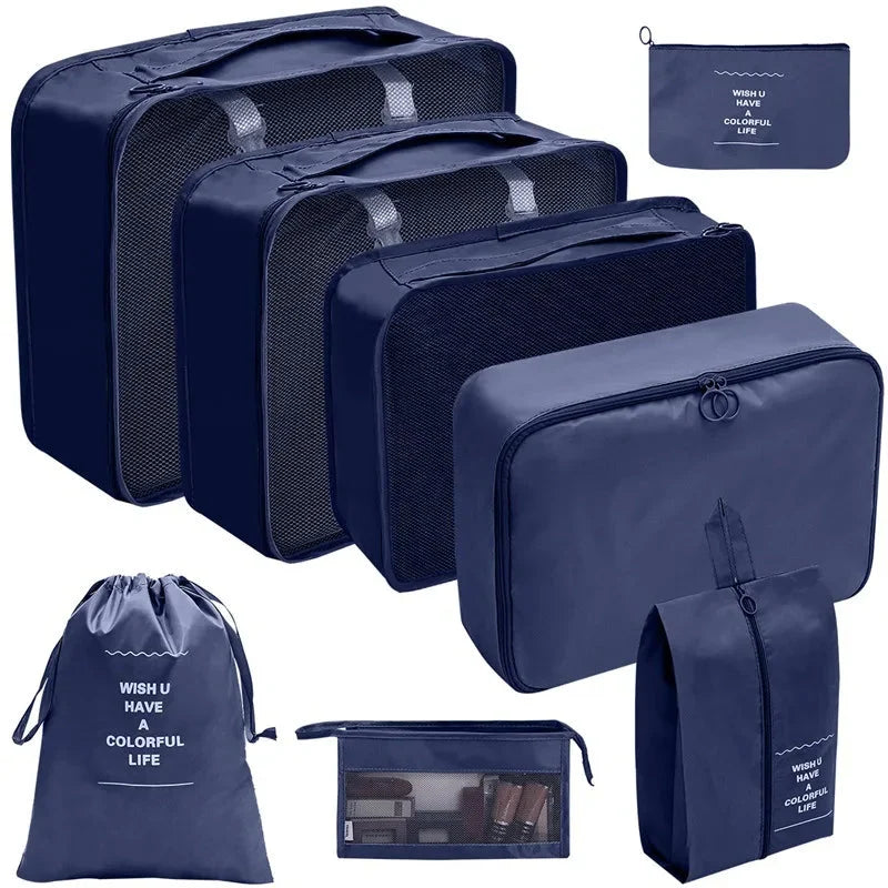Navy blue packing cubes set with mesh panels and zippered organizer bags for travel.