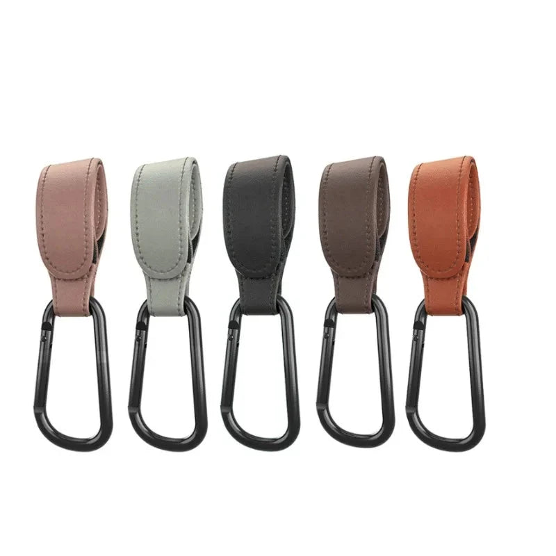 Assorted PU stroller bag hanger hooks with black metal S clips, beige, gray, and tan