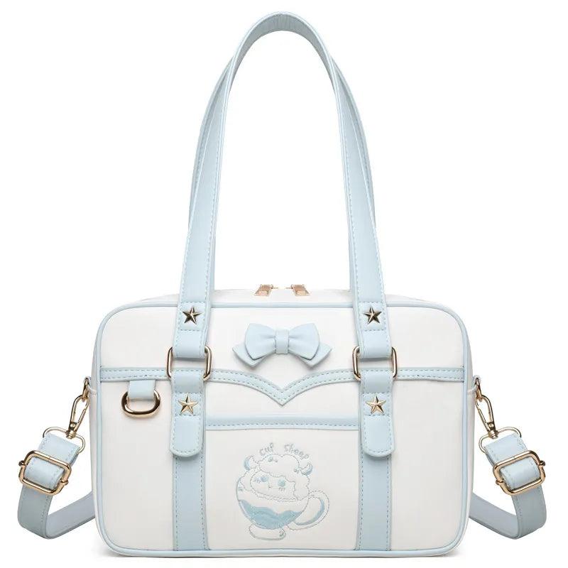 Light blue-and-white kawaii messenger bag with bow front, star accents, and side handles
