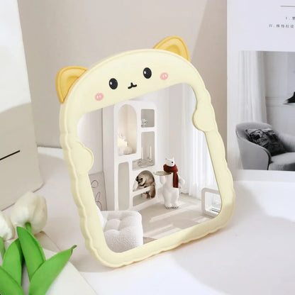 Cream and yellow animal-shaped desktop mirror with round ears and cute face