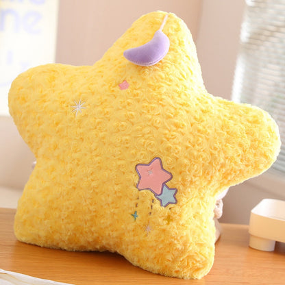Yellow star plush pillow with lavender crescent cap and stitched star patch details