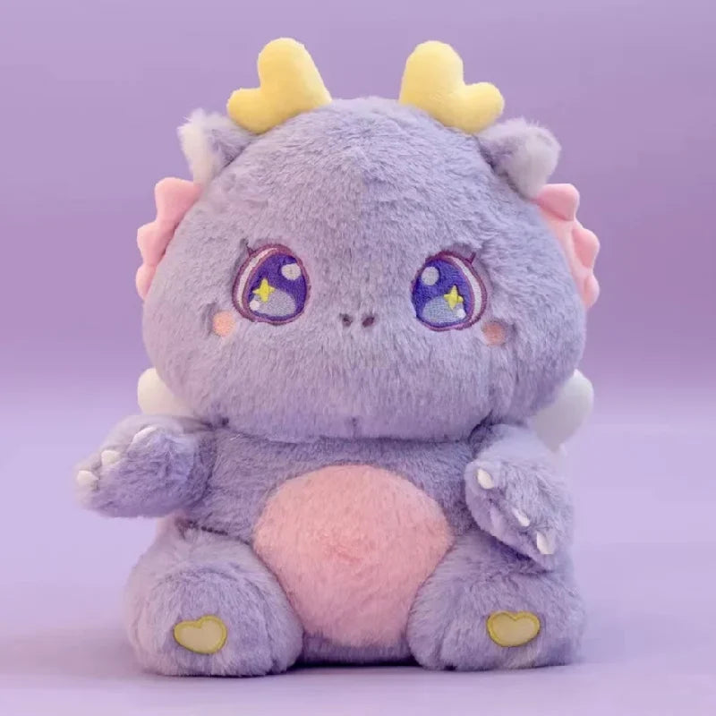 Purple baby dragon plush with star-eye embroidery, yellow horn tips, and heart paws