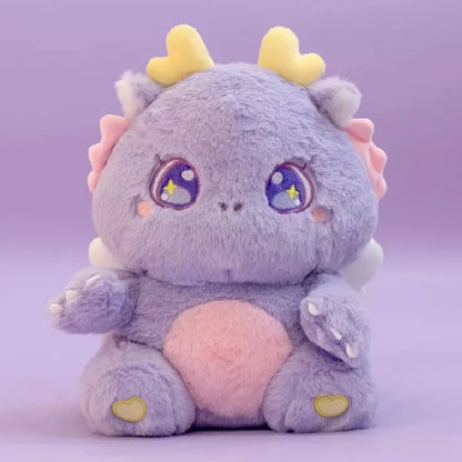 Purple baby dragon plush with star-eye embroidery, yellow horn tips, and heart paws