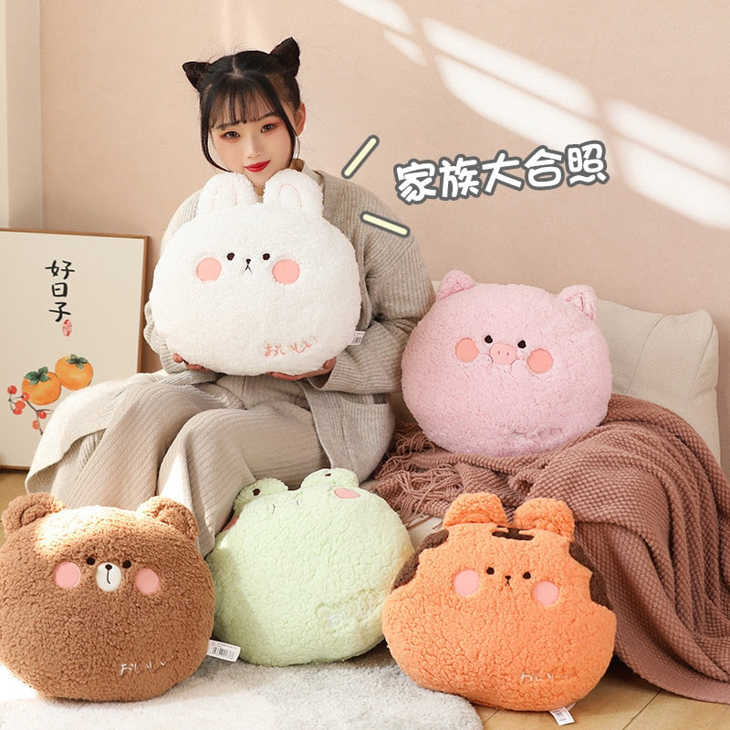 Assorted animal plush cushion pillows on sofa: white rabbit, pink pig, orange tiger, more