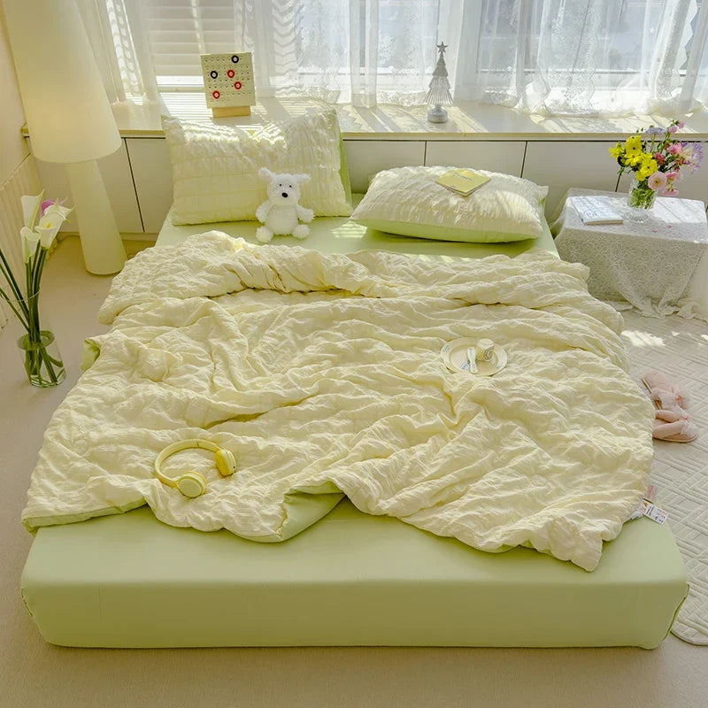 Yellow seersucker duvet cover set with pillow shams and crinkle quilted texture