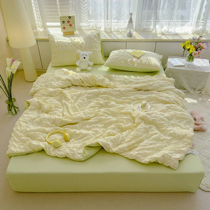 Yellow seersucker duvet cover set with pillow shams and crinkle quilted texture