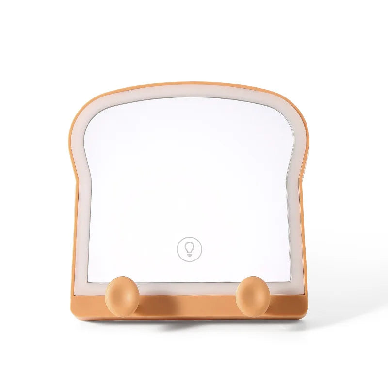 Toast-shaped LED makeup mirror with blank screen, warm light border, phone stand pegs