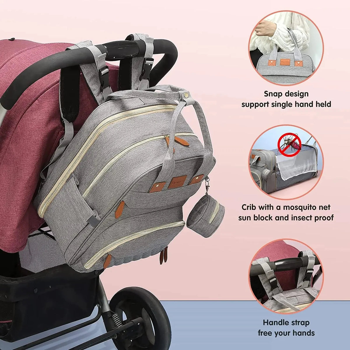 Gray diaper bag backpack with foldable baby bed, handle strap, and stroller attachment.