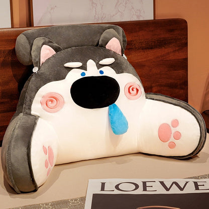 Gray animal reading pillow shaped like a dog, with large black snout and paw accents