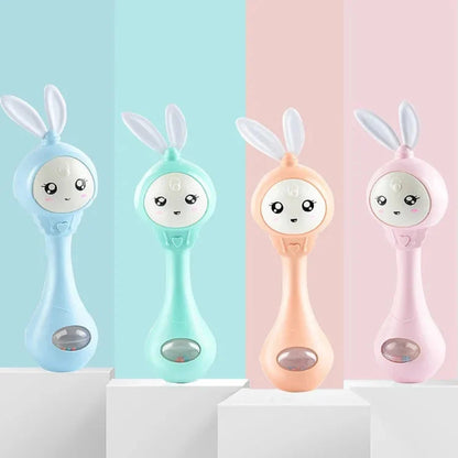 Rabbit baby rattle toys in blue, teal, peach, and pink colors