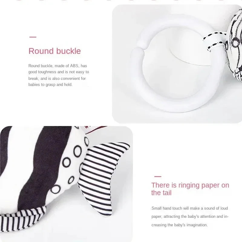 Plush rattle tail with round buckle clip and black-and-white striped fabric