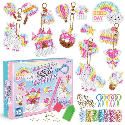 Diamond painting keychain kit set with assorted unicorn, cake, star, and heart charms plus tools.