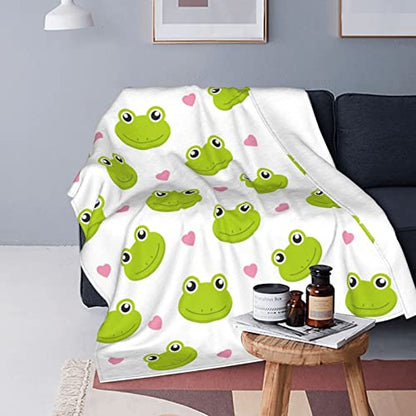 Flannel frog blanket in white with green frog faces and pink heart pattern