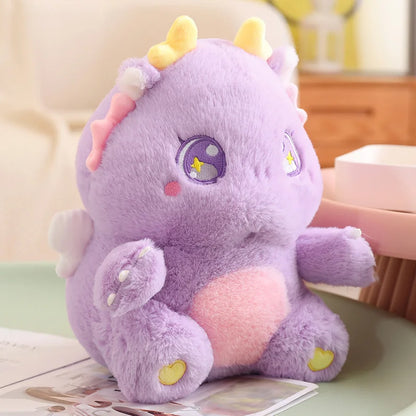 Purple dragon plush toy with heart markings, wings, and curled tail
