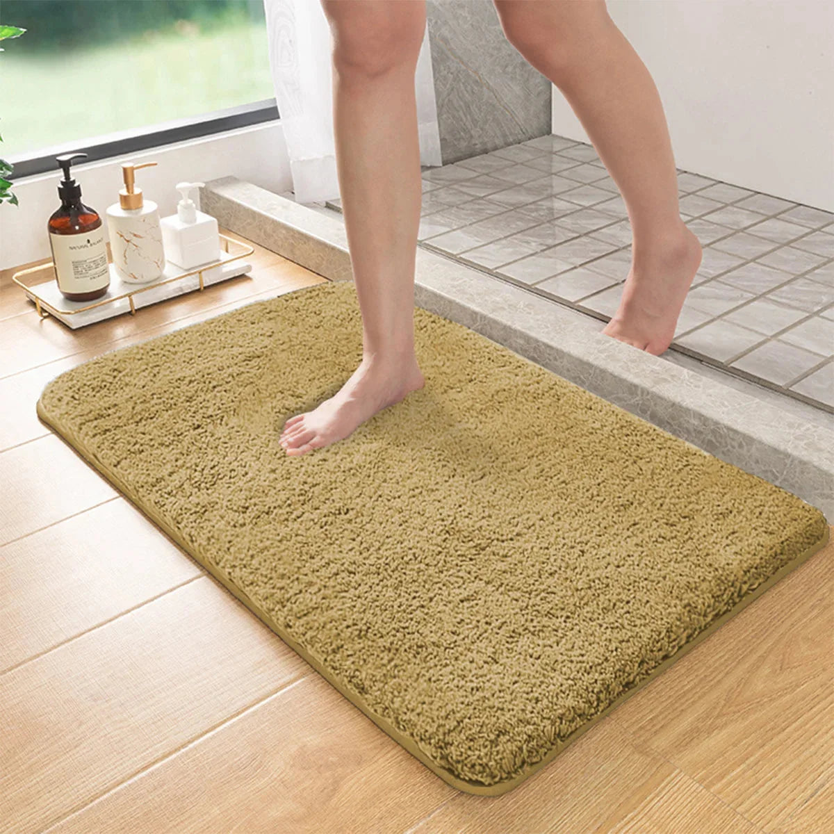 Beige long-pile absorbent bathroom mat with non-slip backing, rectangular