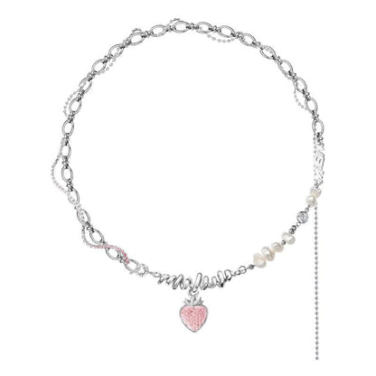 Strawberry pendant necklace with pink glitter heart charm, pearl beads, and dangling chain