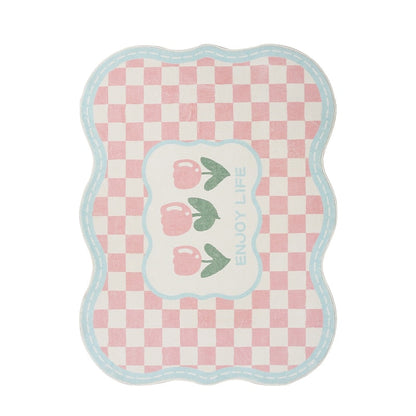 Pink gingham area rug with tulip graphic, blue border, scalloped shape