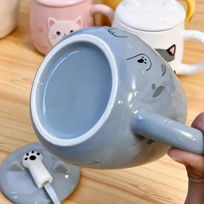 Blue cat ceramic mug with matching lid and spoon rest on top