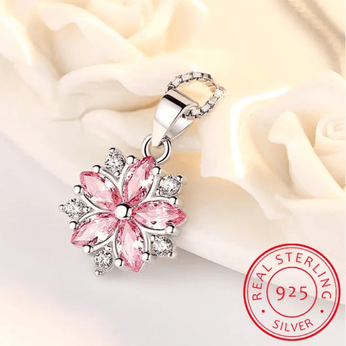 Silver-tone cherry blossom pendant with pink marquise petals and clear stones