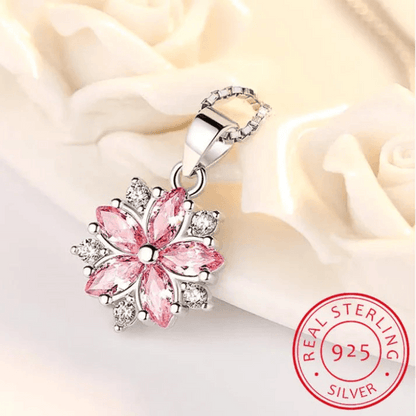 Silver-tone cherry blossom pendant with pink marquise petals and clear stones
