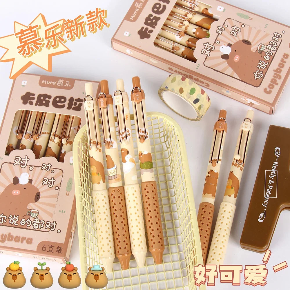 Capybara gel pens with boxed set and display, beige and tan barrels with graphics