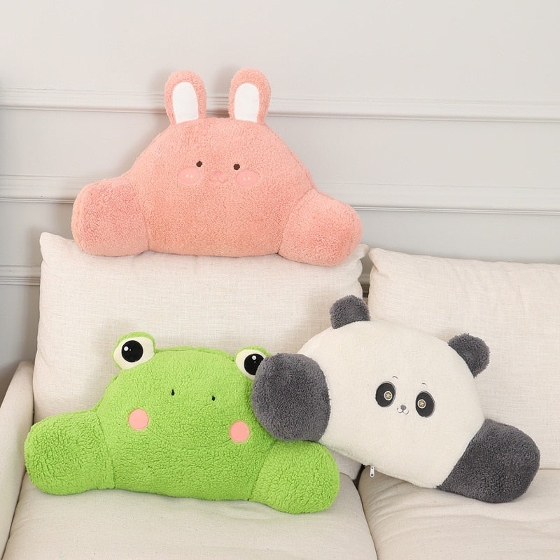 Plush animal cushions set: pink bunny, green frog, and panda on a sofa.