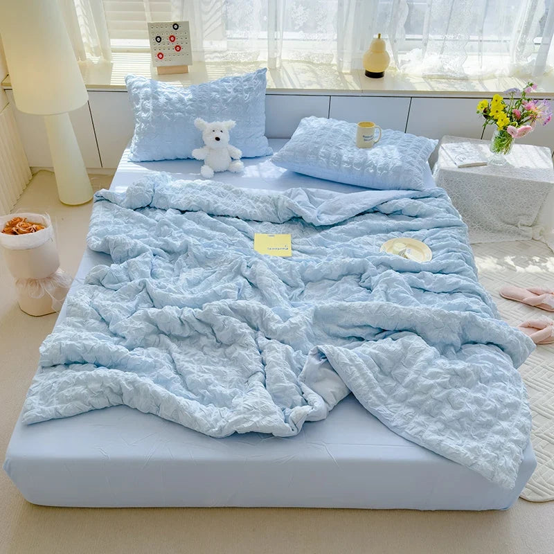 Light blue seersucker duvet cover set with matching pillow shams and crinkle texture