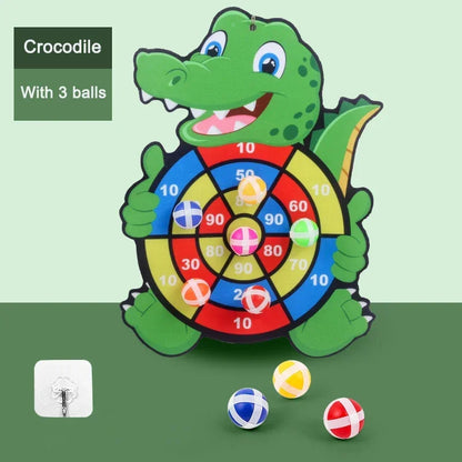 Crocodile dart board toy with three colorful sticky balls and numbered target
