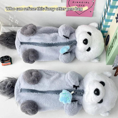 Otter plush pencil case in gray and white with blue star charm and zipper closure