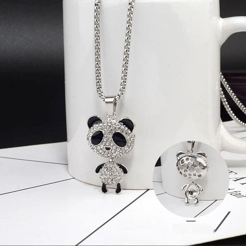 Rhinestone panda pendant necklace displayed on white jewelry stand with extra angle