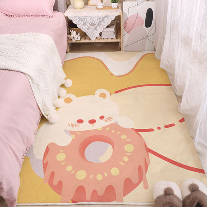 Cute elephant and donut print area rug with yellow border and peach accents.
