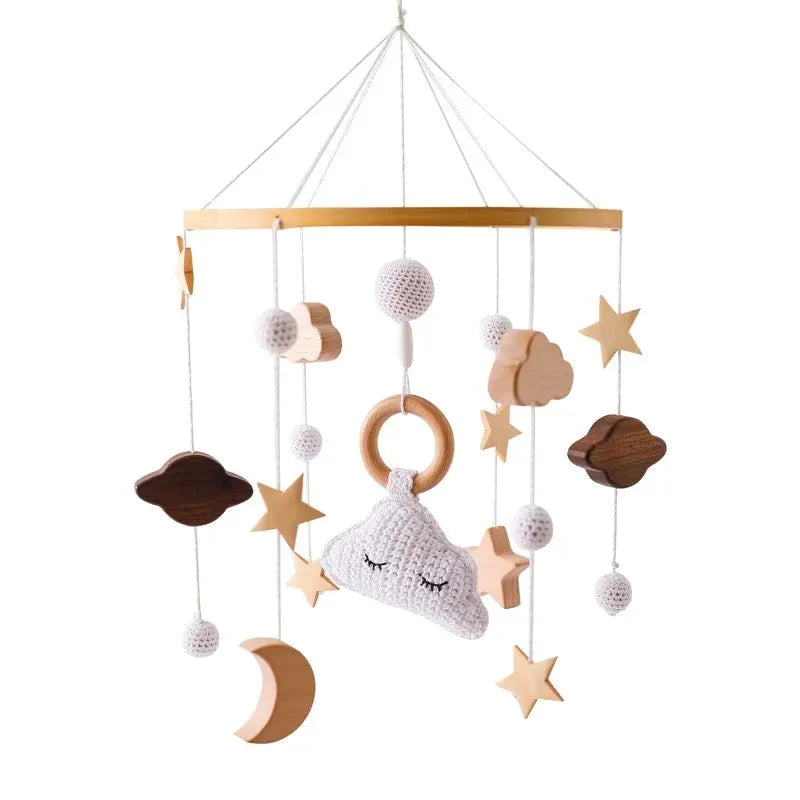Wooden baby crib mobile with hanging cloud, moon, star, and round bead accents