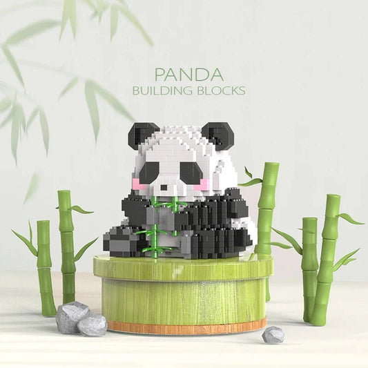 Panda building block model with black ears, pink cheeks and green bamboo base