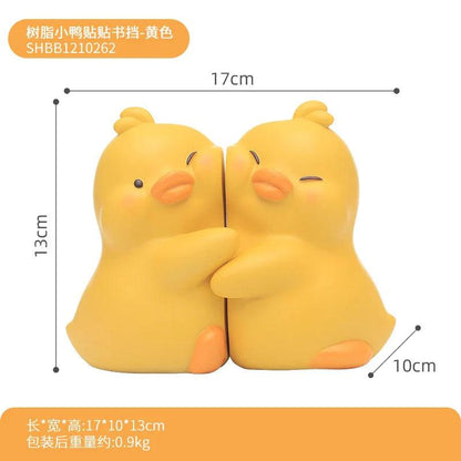 Yellow duck book end set of two, shown with size outline and dimension marks
