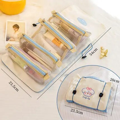 Rolled roll-up makeup bag with three long clear zip pouches and cute bear front patch